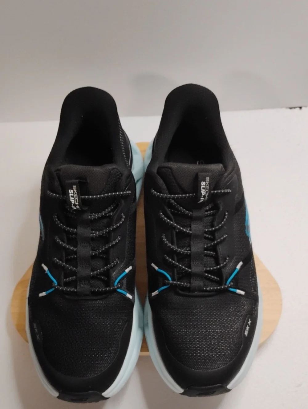 Skechers Men's Black Sneakers with Light Blue Accents